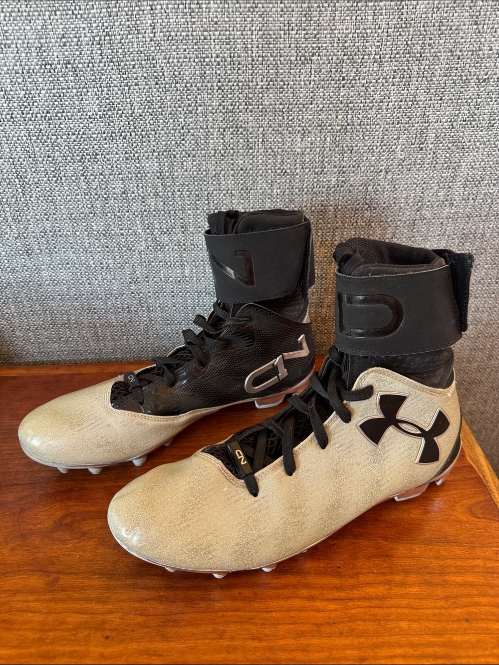 Under Armour Black and White Football Cleats with High Ankle Support